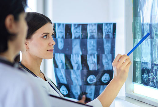 Two doctors viewing x-rays.